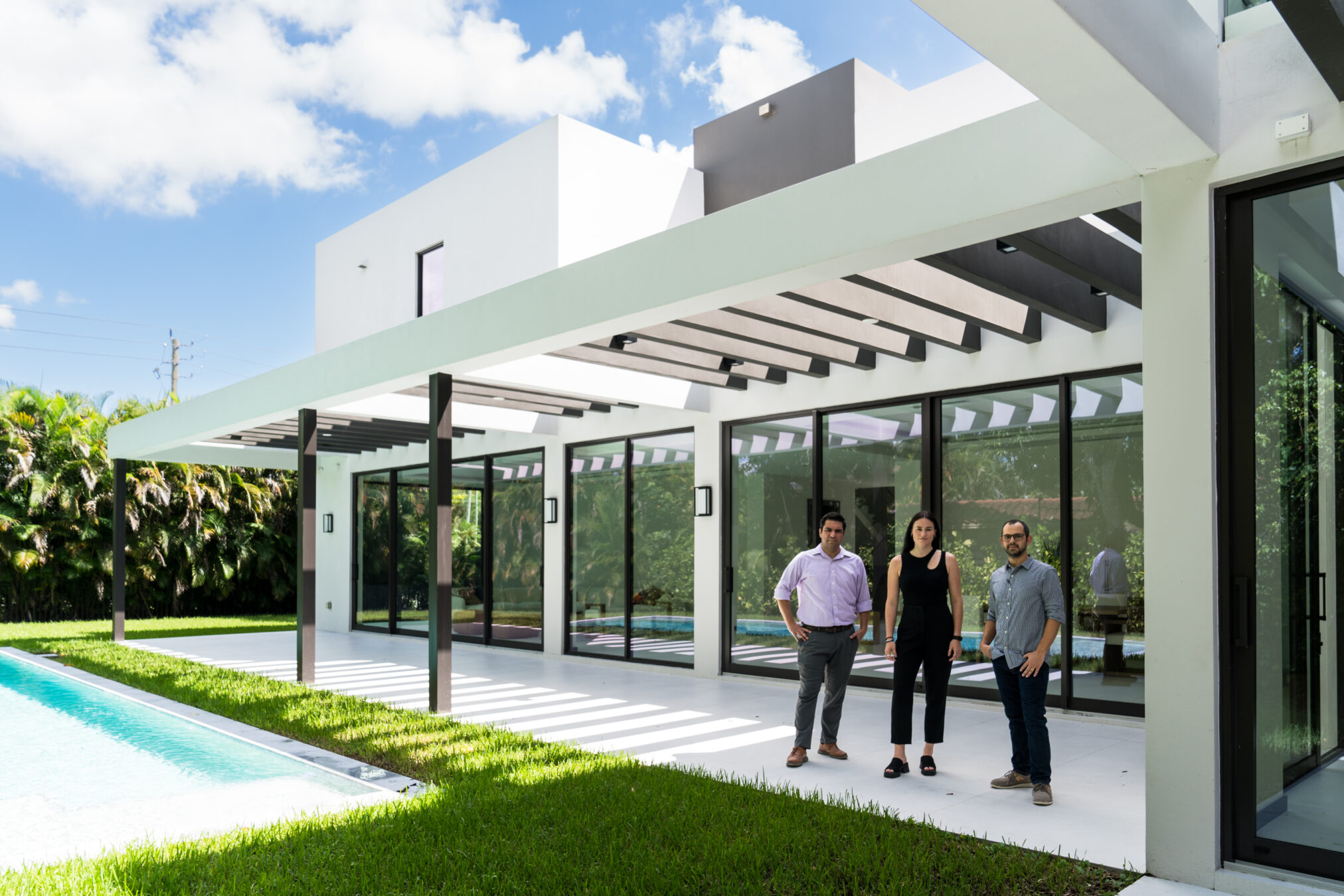 The AGD Team is seen pictured here on site at one of their luxurious projects. They look confident and easy going and are the best way to find real estate investment properties in Miami because of their expertise and research.